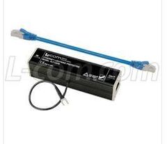 In-line lightning surge protector, protects connected devices from electrical surges.