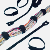 Velcro tie for cable management, helps in organizing and securing cables.